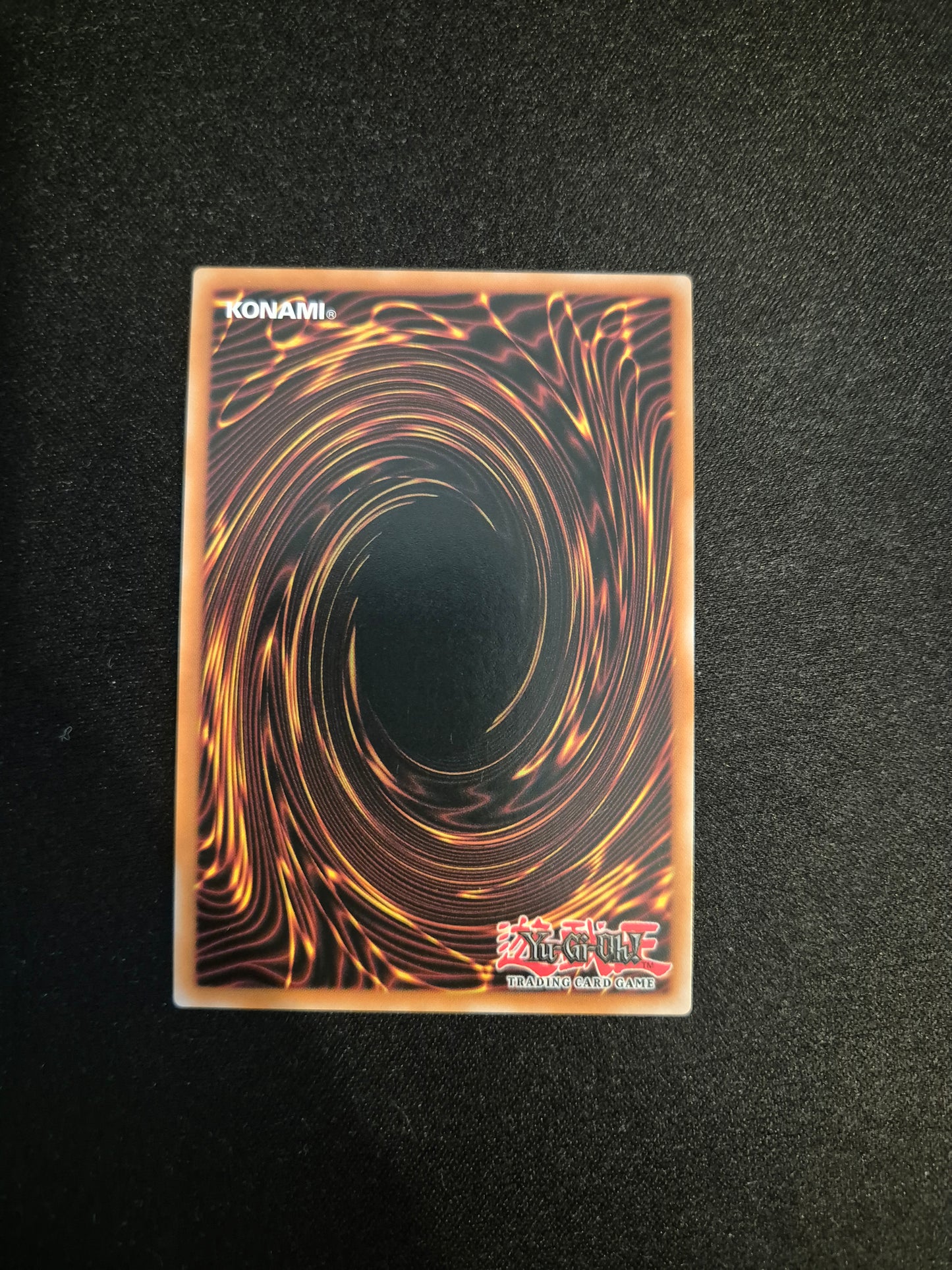 Carte Yu-Gi-Oh! L'Offrande du Bras Gauche Secret Rare RA04-FR086