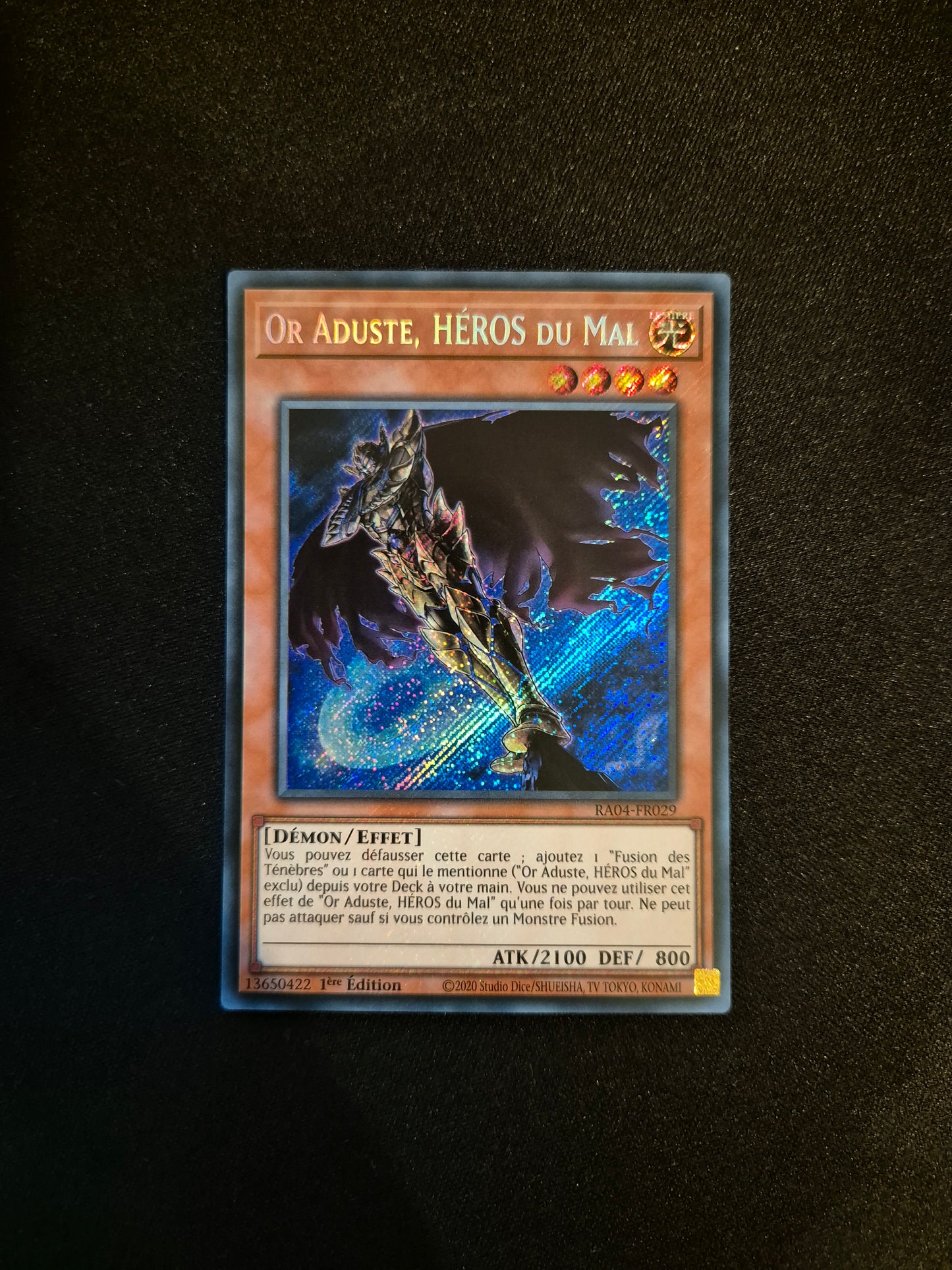 Carte Yu-Gi-Oh! Or Aduste Héros du Mal Fou Secret Rare RA04-FR029