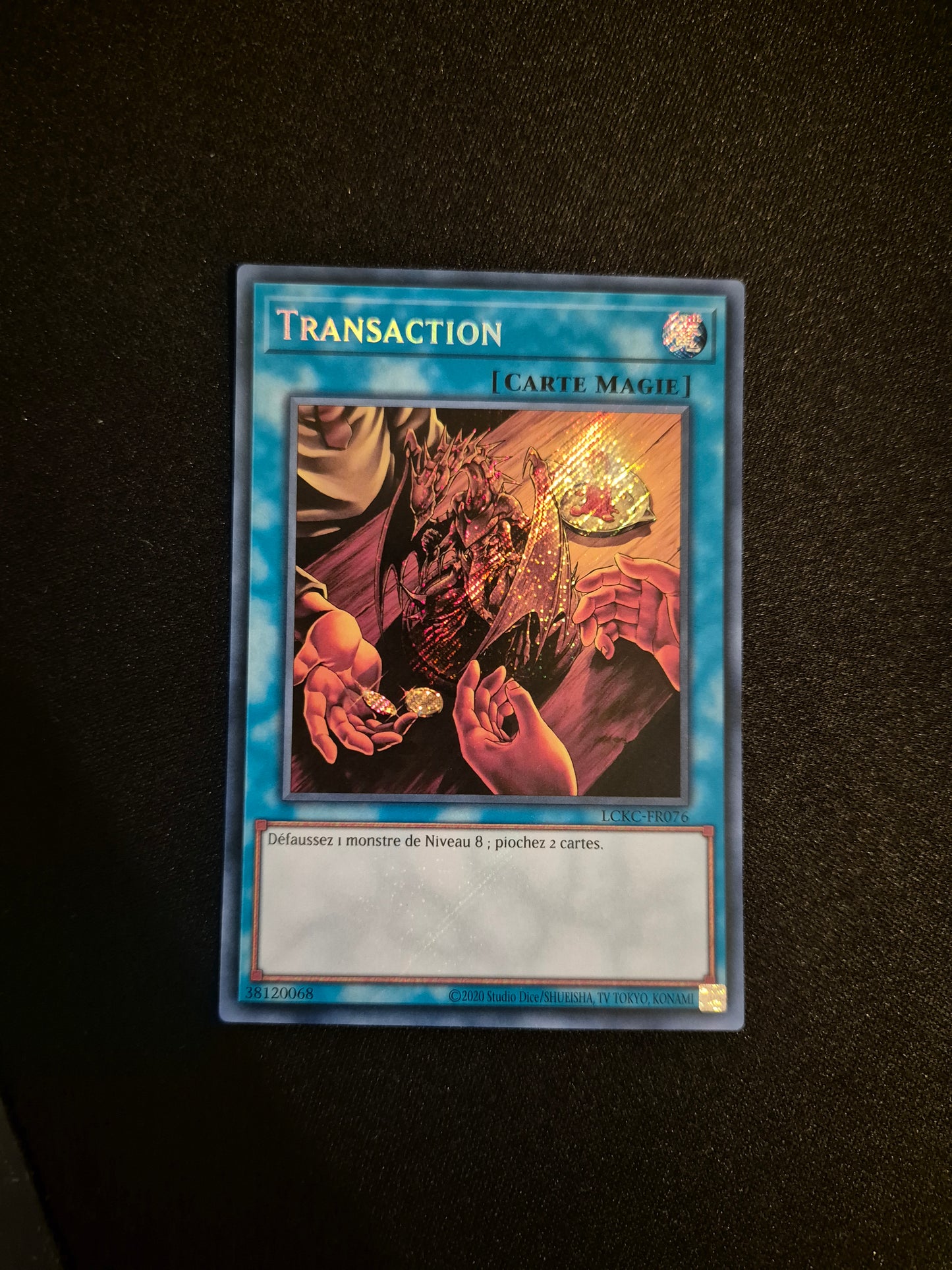 Carte Yu-Gi-Oh! Transaction Secret Rare LCKC-FR076
