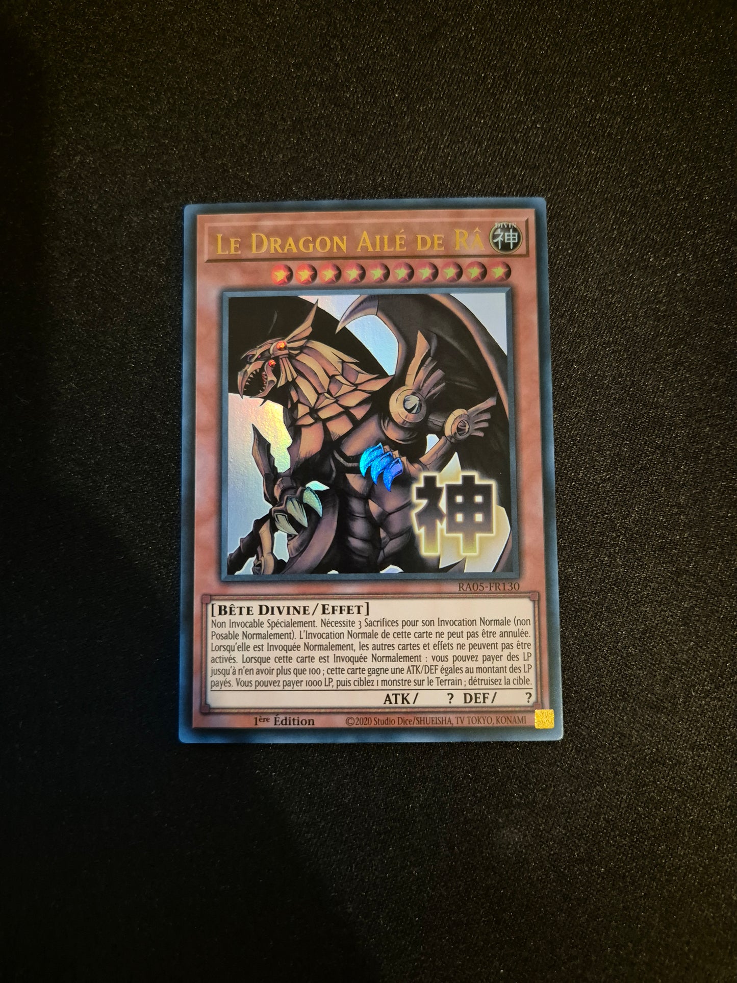 Carte Yu-Gi-Oh! Le Dragon Ailé de Ra ALT Stamped Ultra Rare RA05-FR130