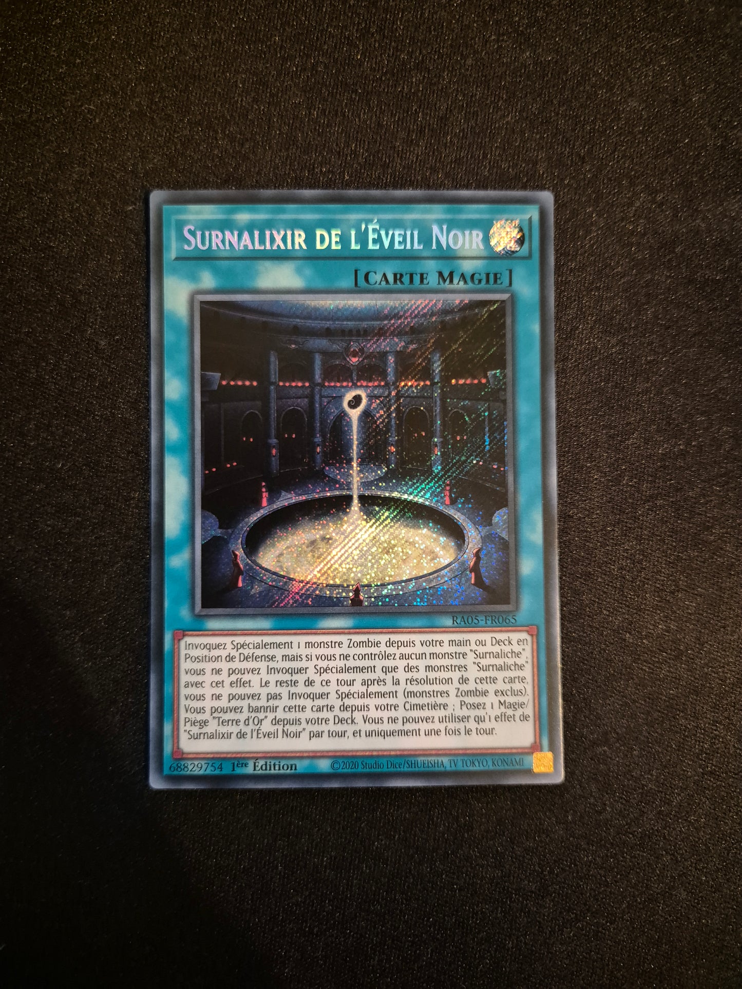 Carte Yu-Gi-Oh! Surnalixir de l'Eveil Noir Secret Rare RA05-FR065